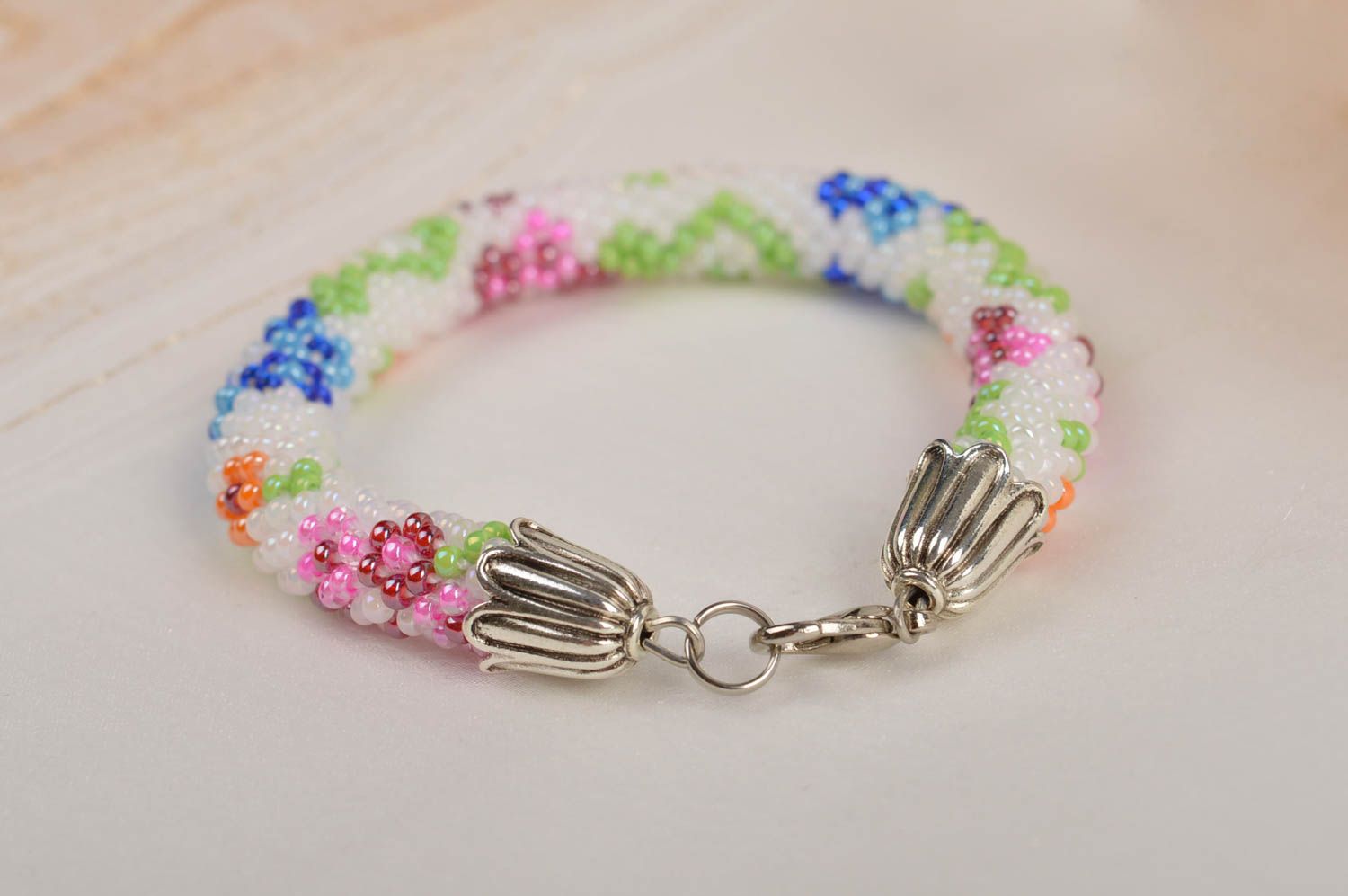 Handmade beaded cord kids bracelet with floral ornament  photo 1