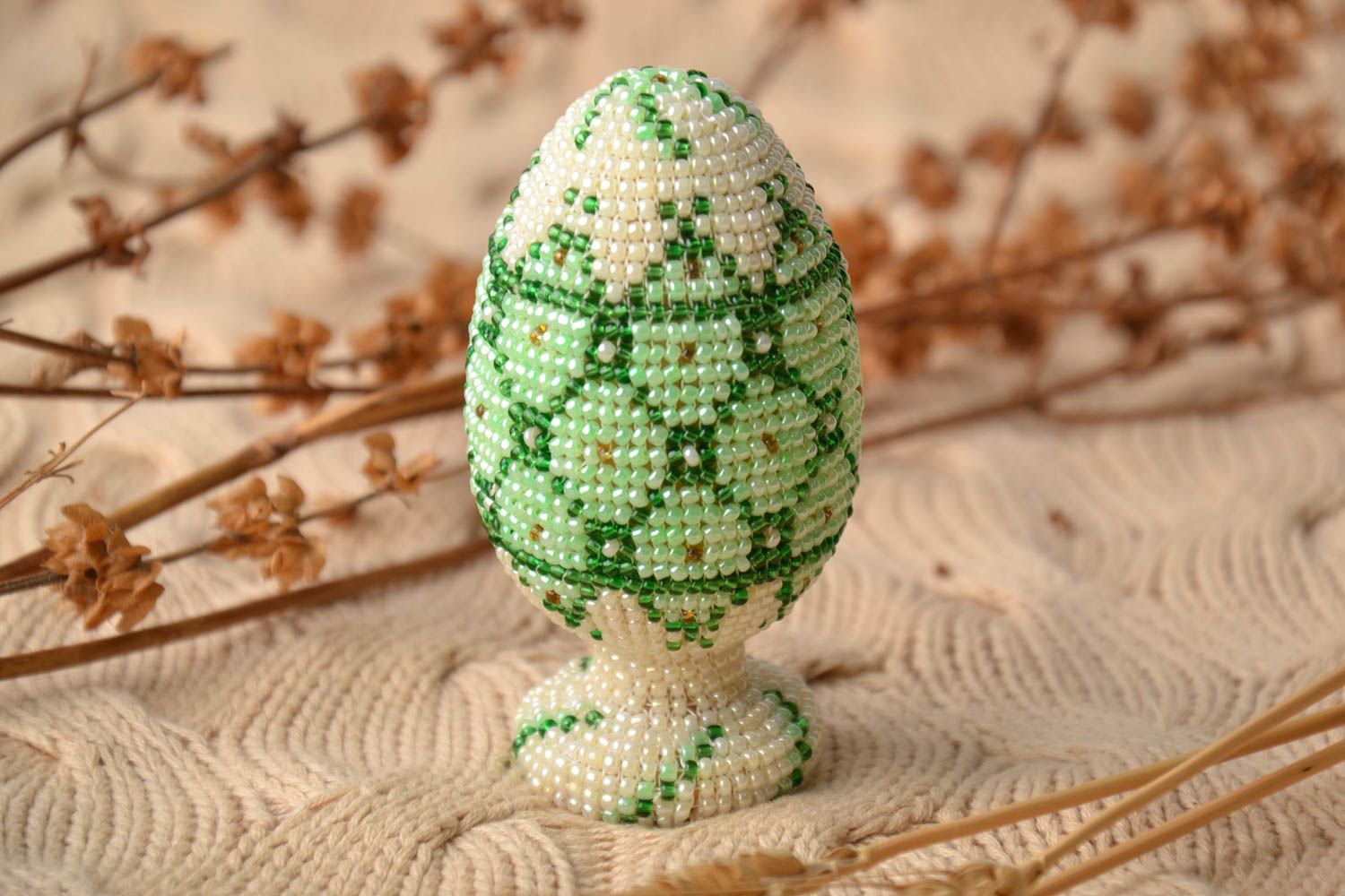Wooden egg woven over with beads photo 1