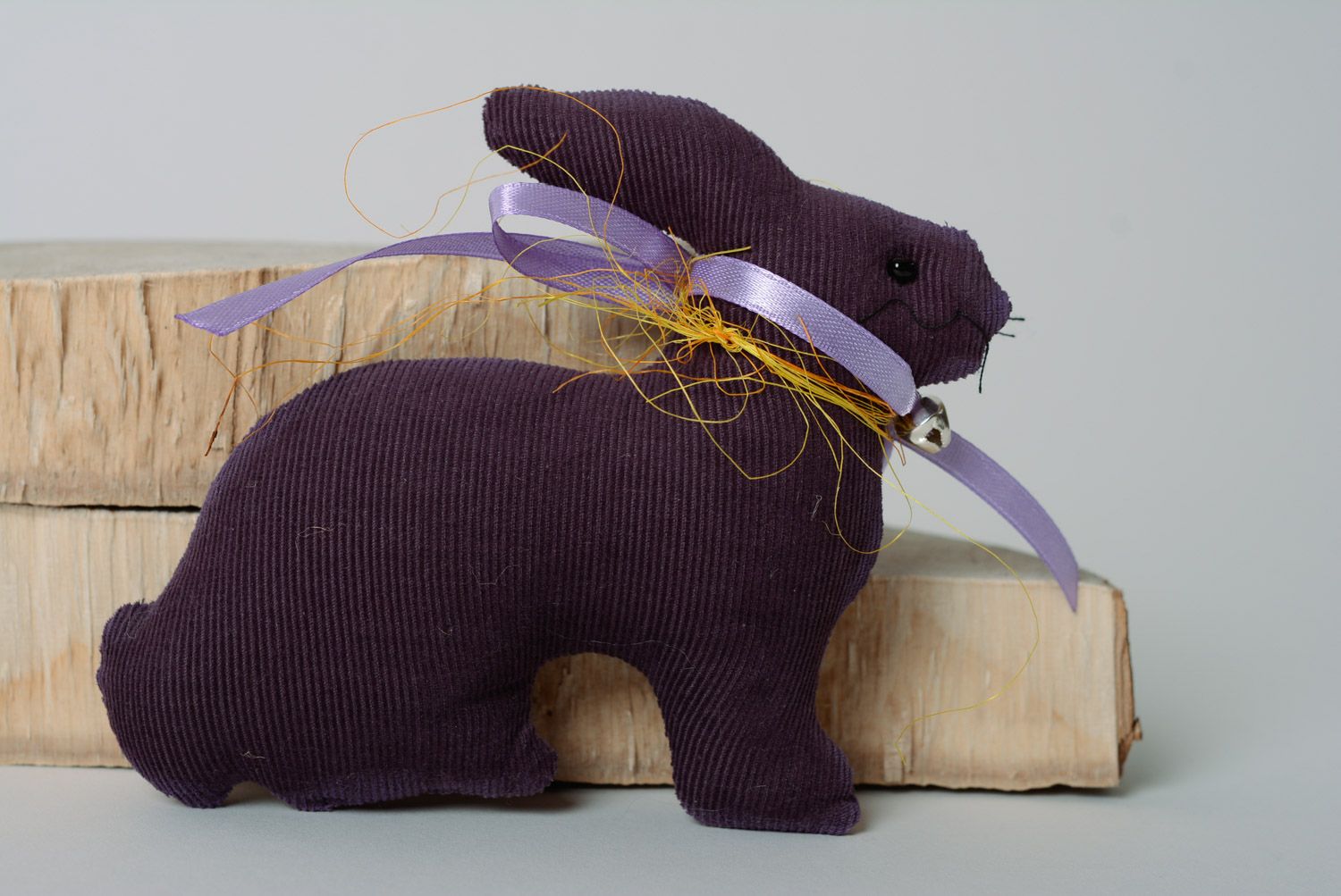 Handmade velvet fabric soft toy hare of violet color with bow photo 1