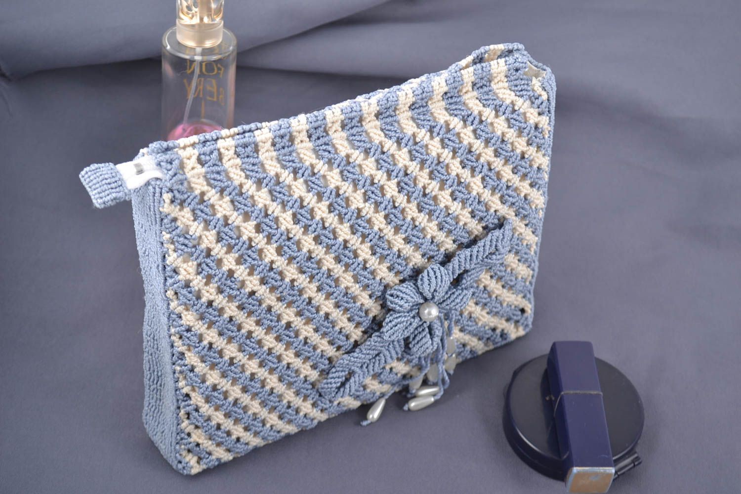 Handmade stylish cosmetic bag braided using macrame technique with blue flower photo 1