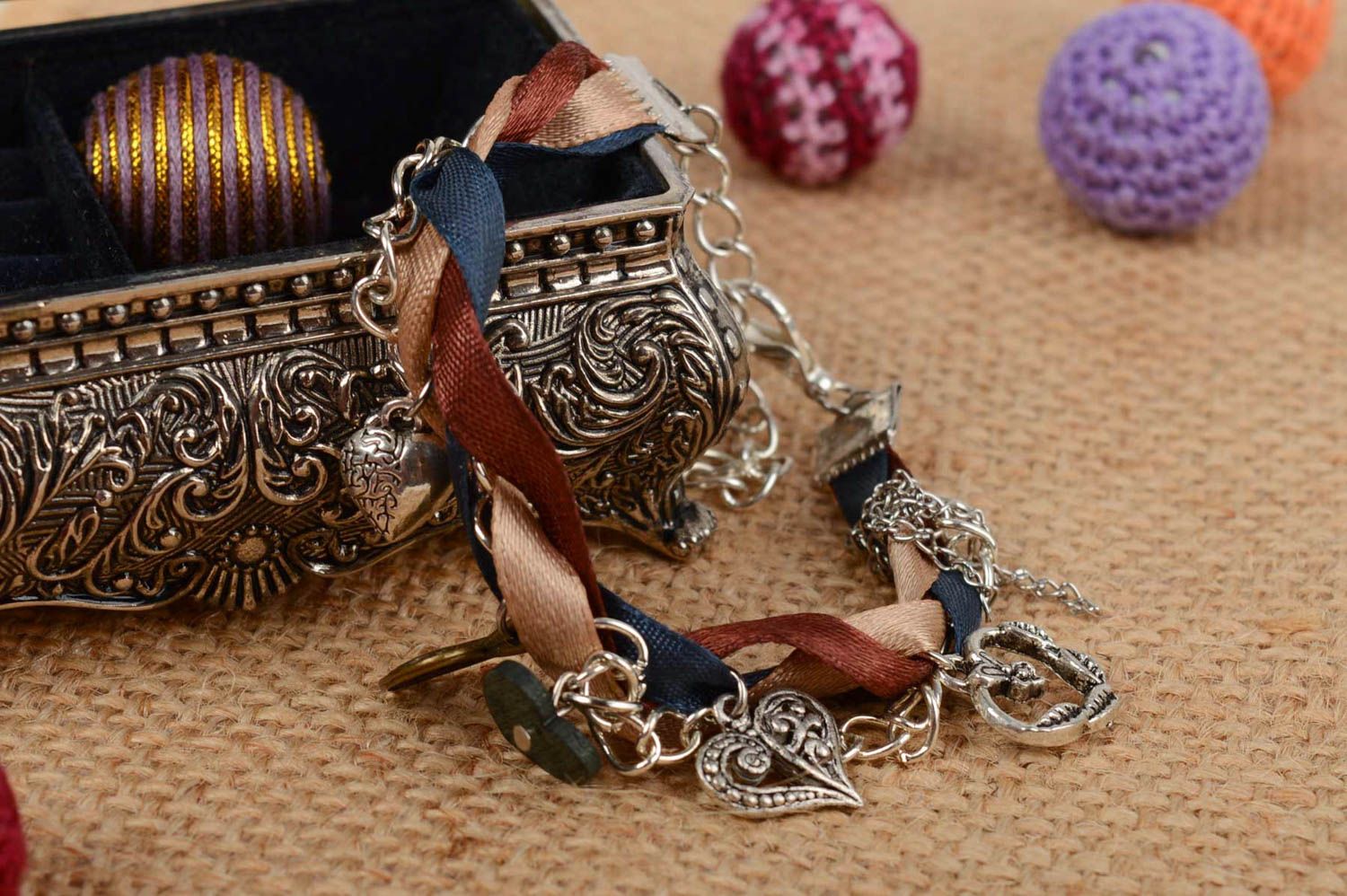 Beautiful women's handmade metal chain bracelet with satin ribbons photo 1
