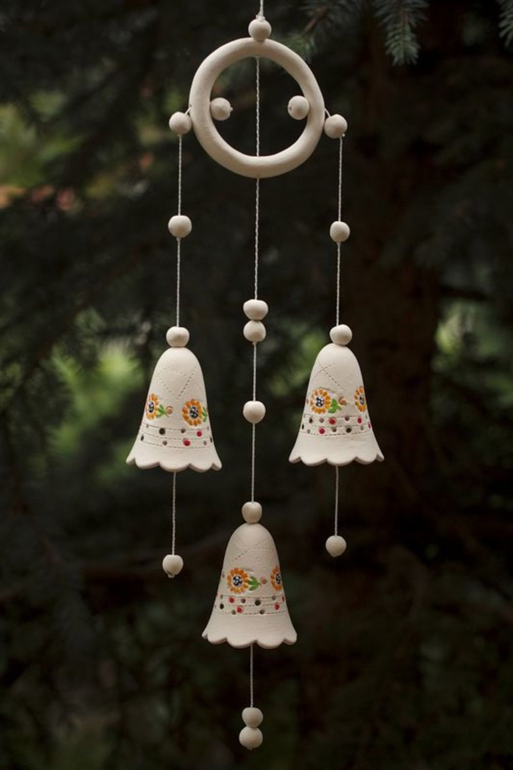 Bells made from white clay with pattern photo 1