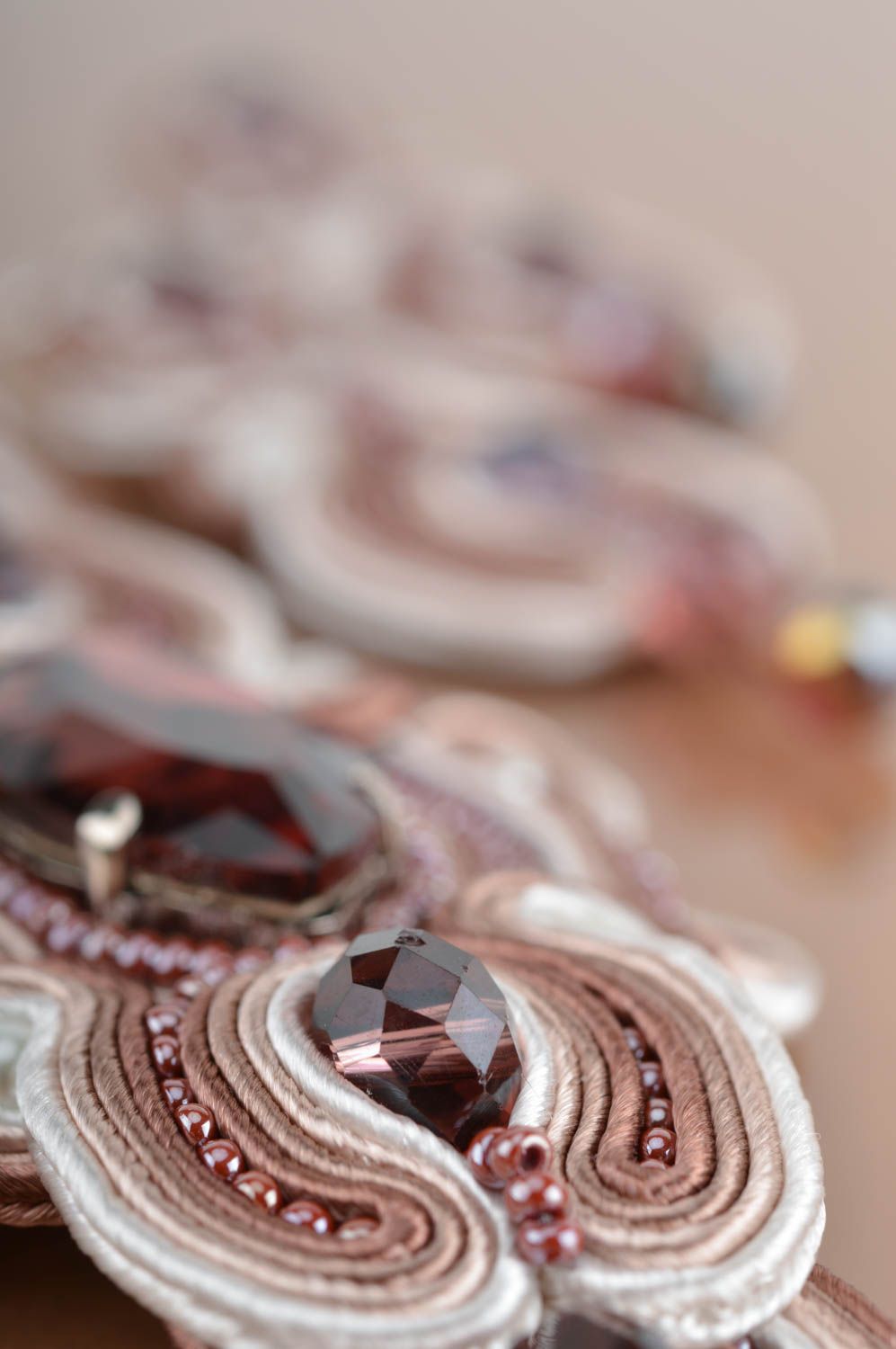 Handmade massive beige bracelet and earrings created using soutache technique photo 4