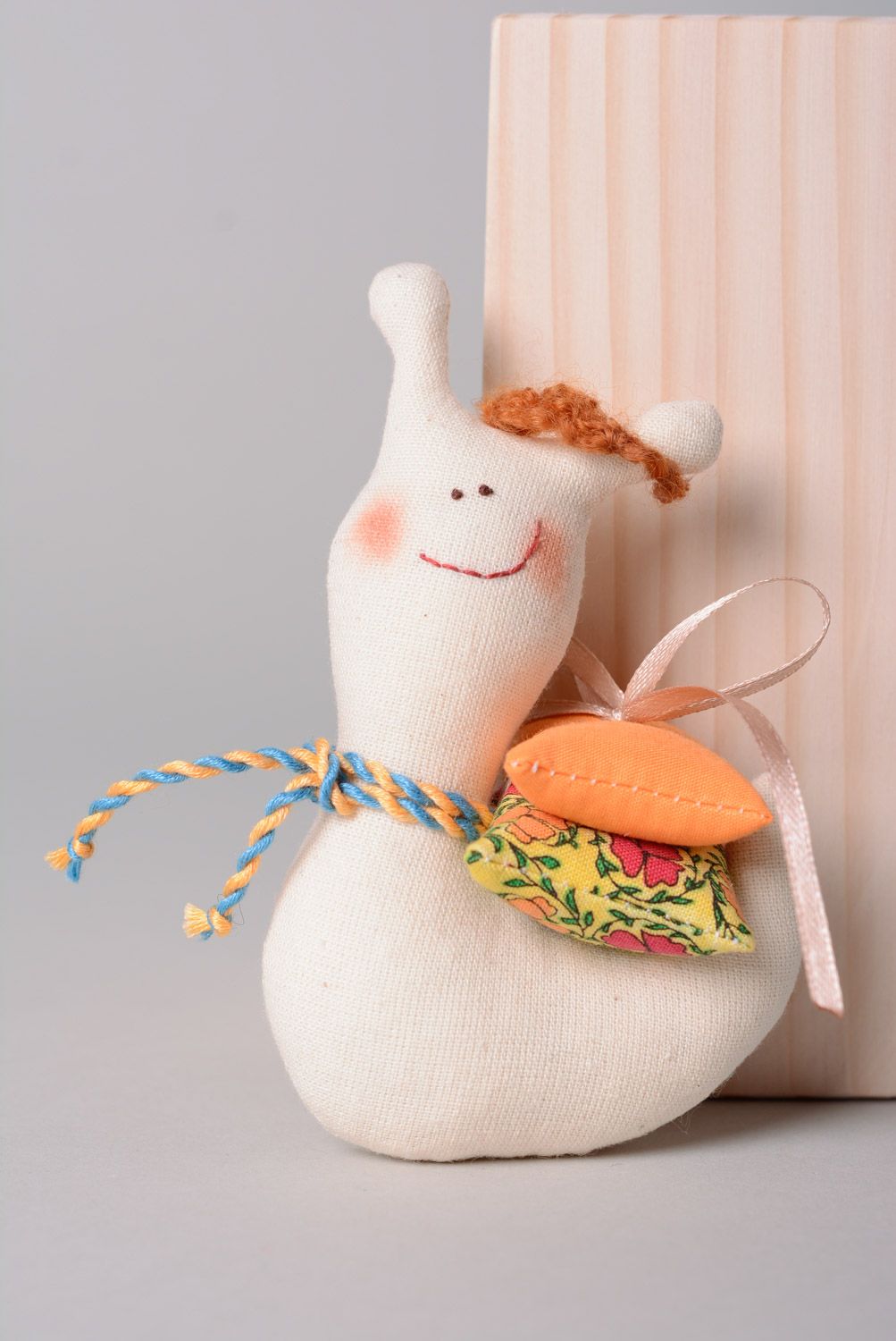 Small handmade designer soft toy sewn of natural fabrics in the shape of snail photo 1