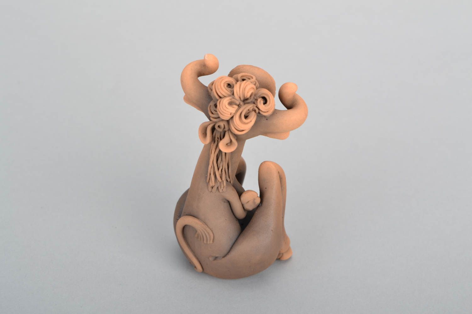 Hand molded designer clay statuette Embarrassed Cow photo 4