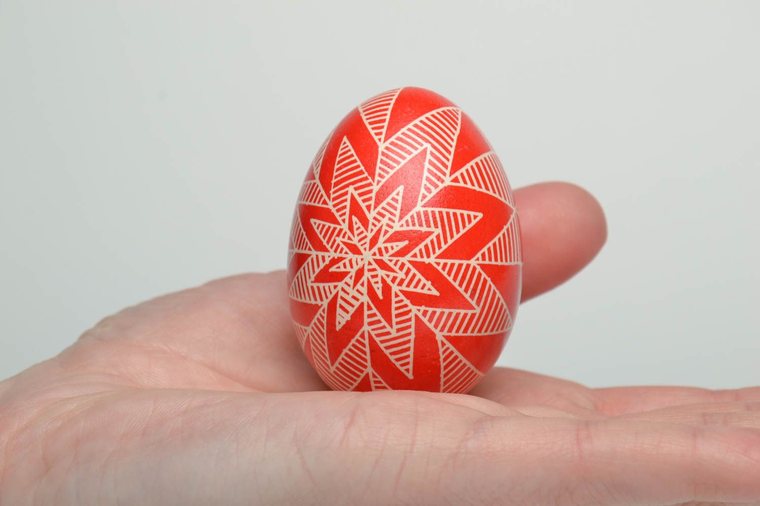 Painted chicken egg of red color photo 5