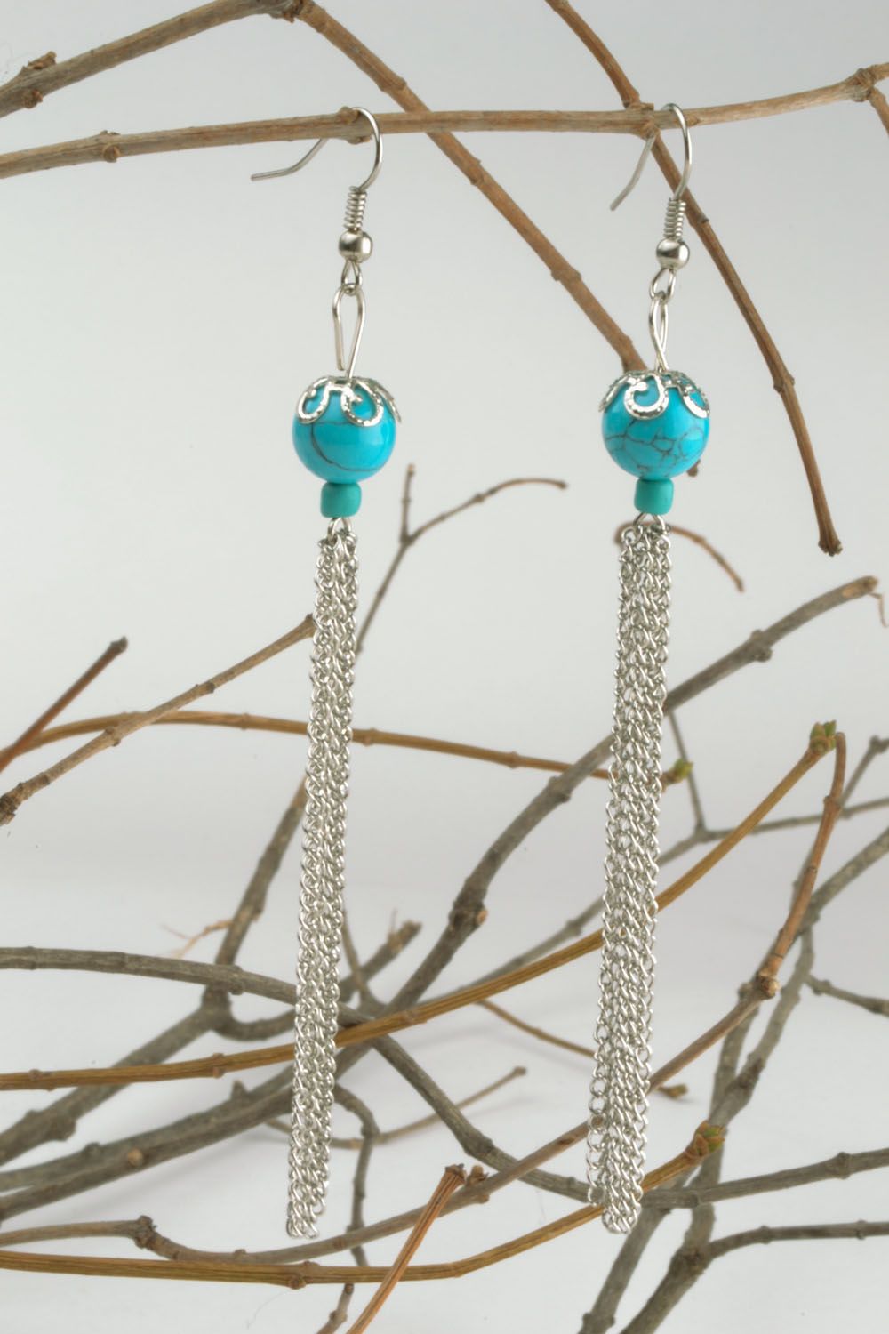 Long earrings with turquoise color beads photo 1