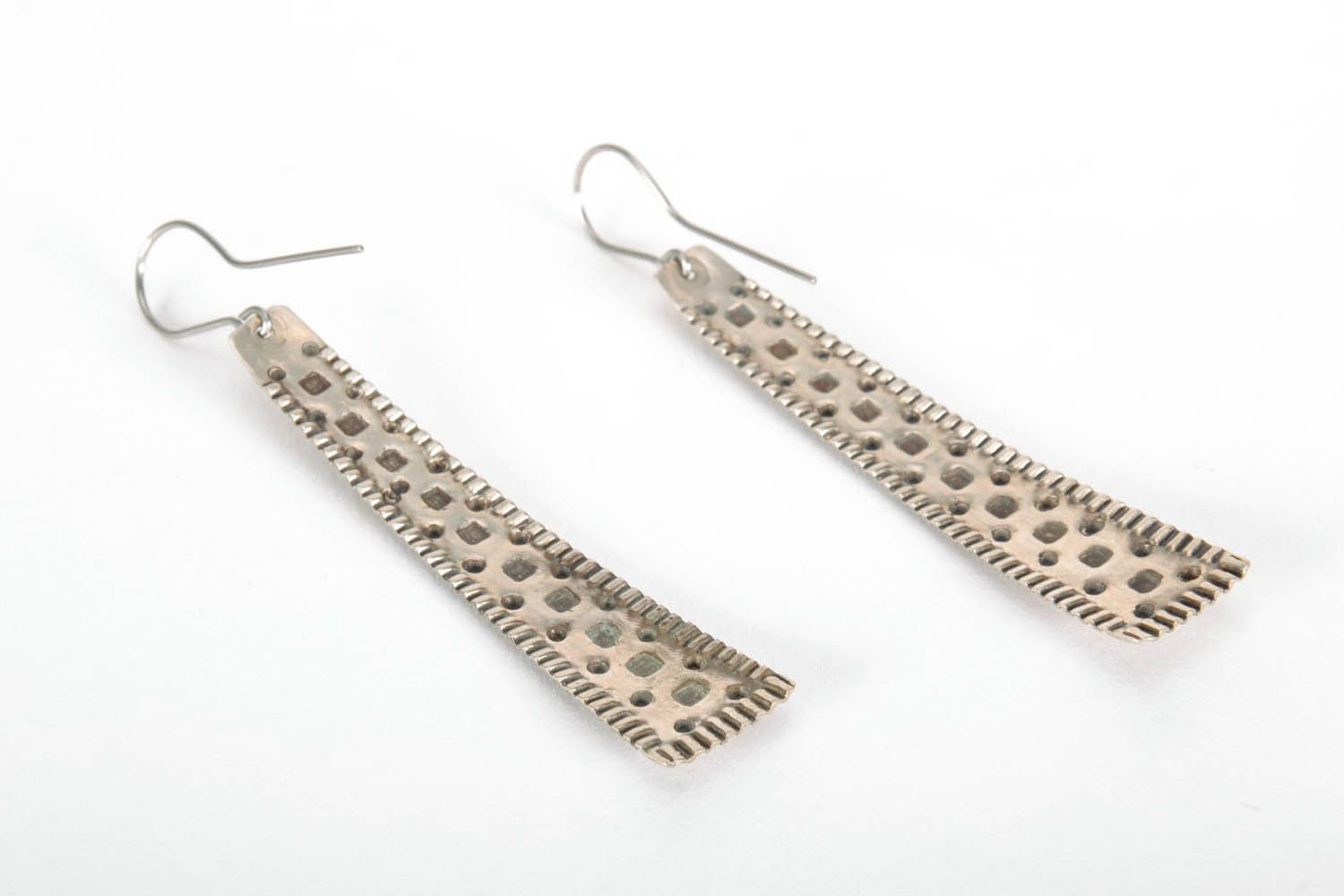 Long metal earrings with ornament photo 3
