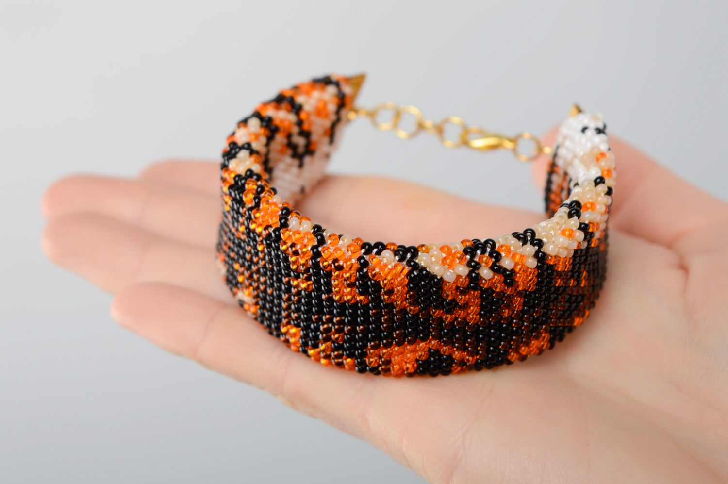Adjustable handmade black and orange beads bracelet with tiger coloring  photo 5