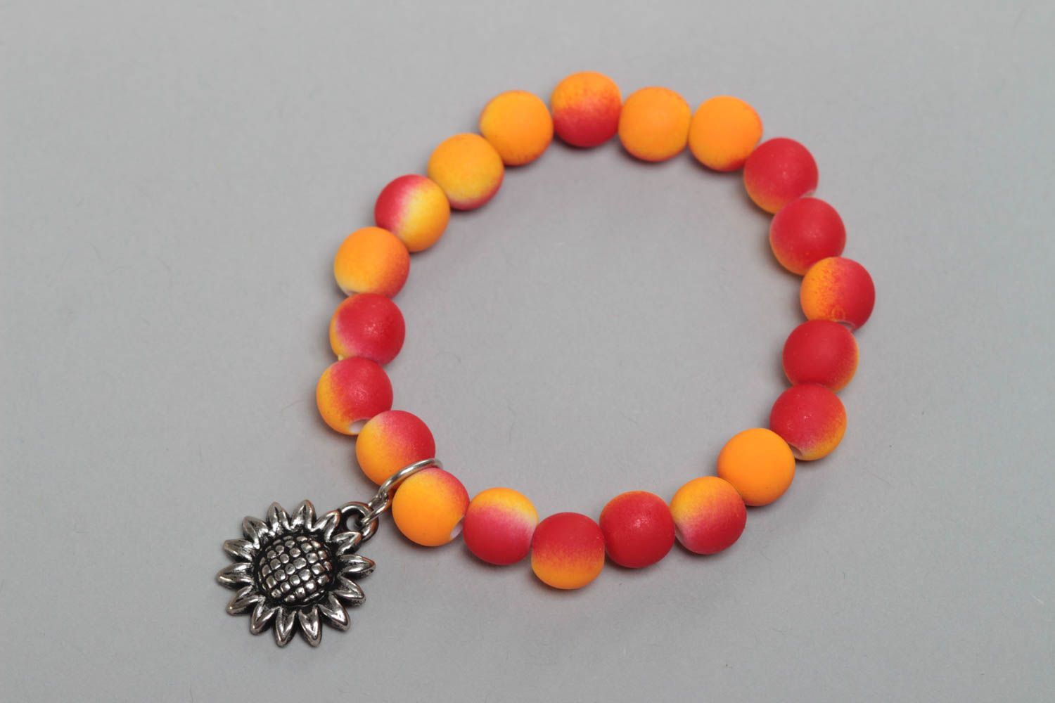 Yellow handmade designer children's bracelet with plastic beads Sunflower photo 2