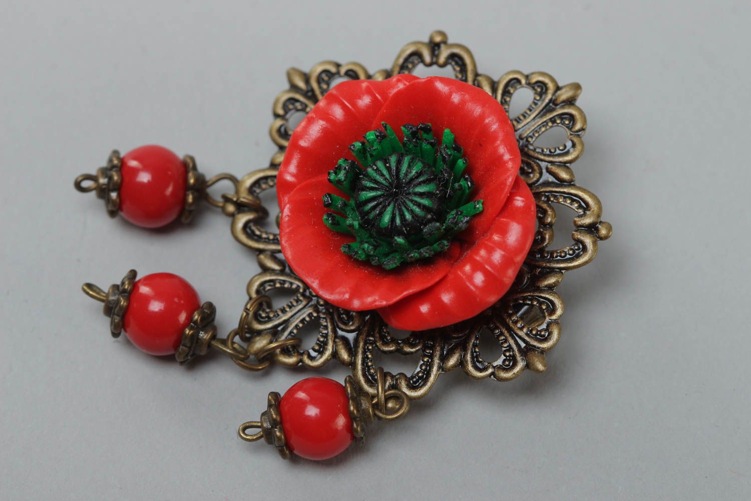 Handmade polymer clay brooch with metal basis in the shape of red and black poppy photo 2