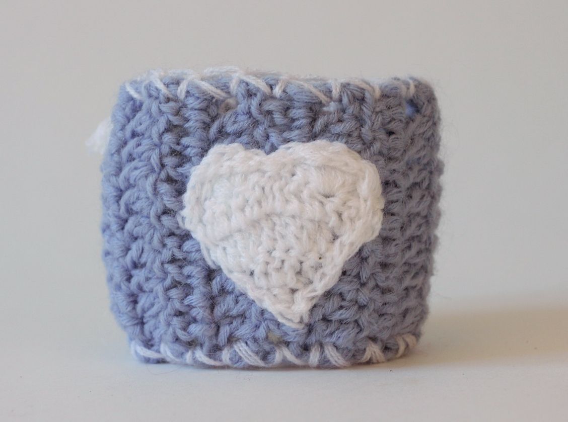 Blue knitted cup cozy photo 1