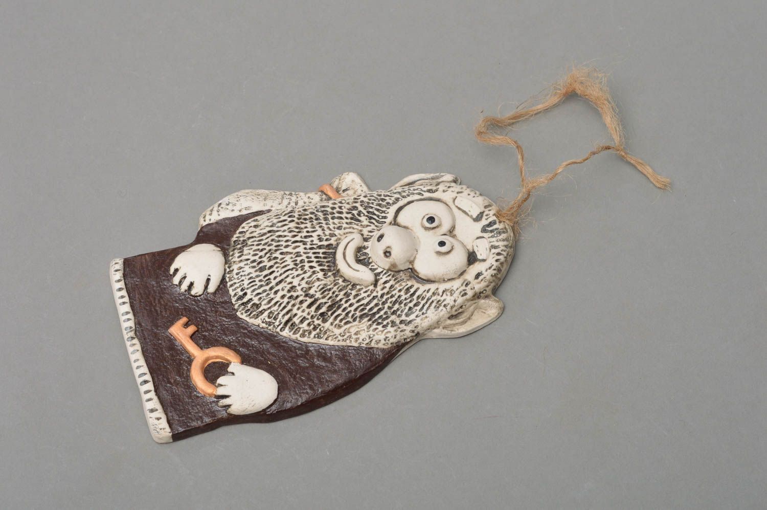Souvenir handmade interior pendant made of porcelain House spirit with key photo 1