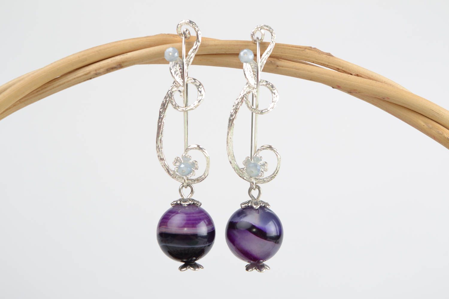 Handmade dangling earrings with silver colored basis and violet agate beads photo 1