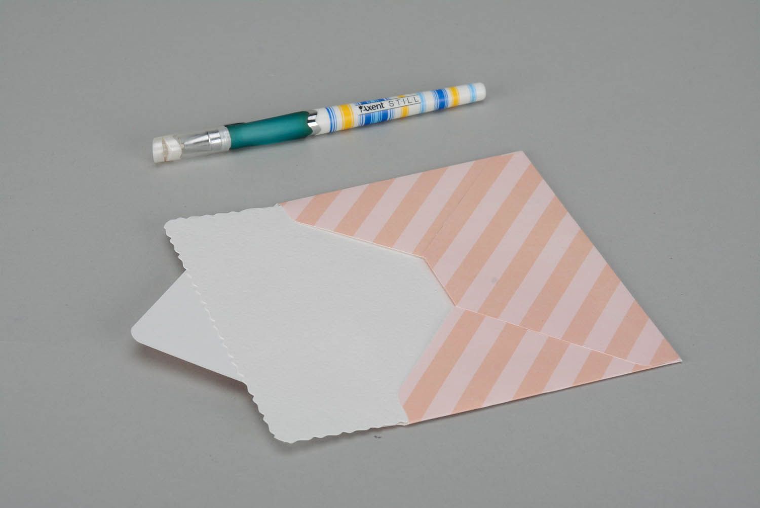 Envelope With beige stripes photo 1