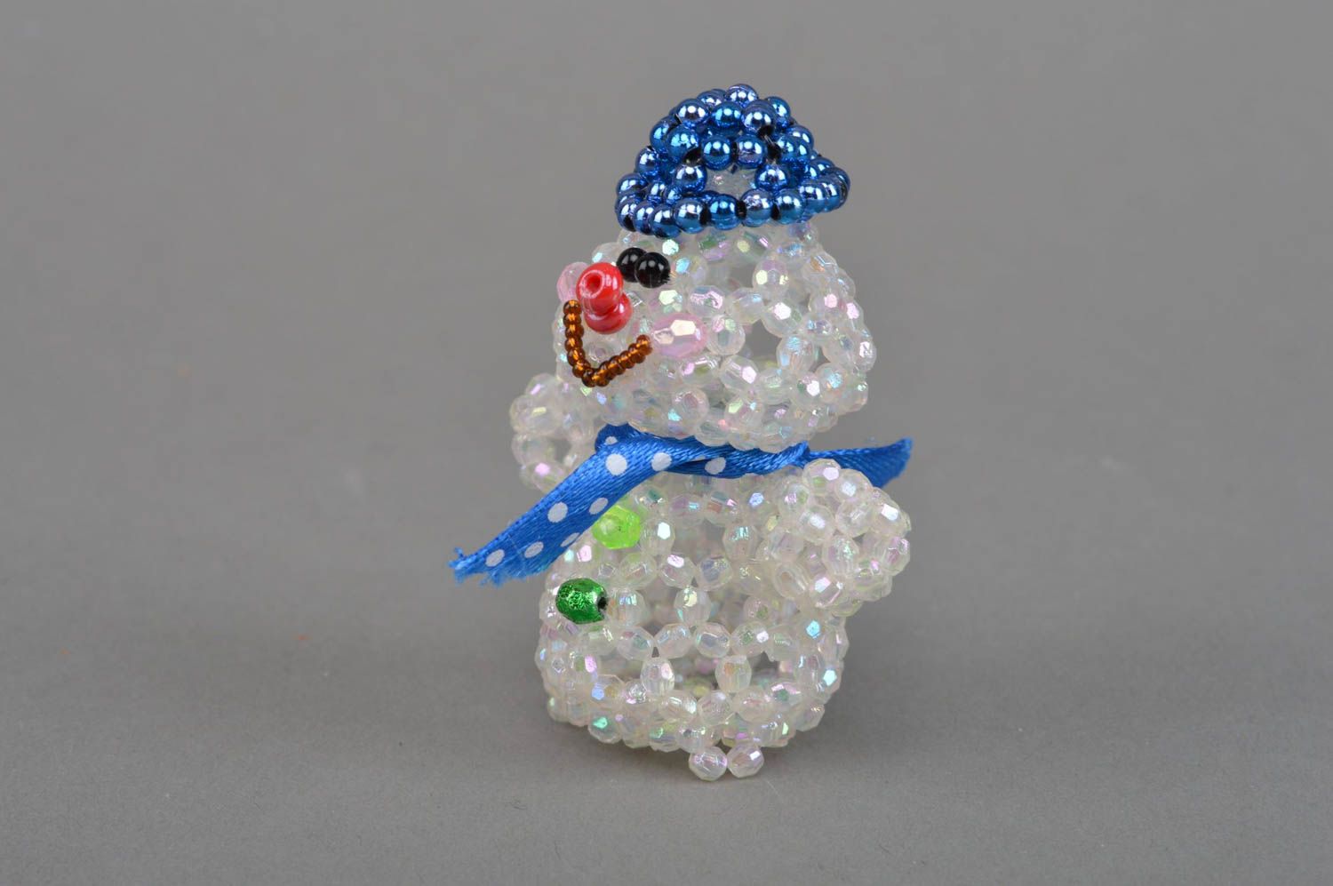 Handmade beautiful souvenir figurine woven of beads Snowman djay for home decor photo 3