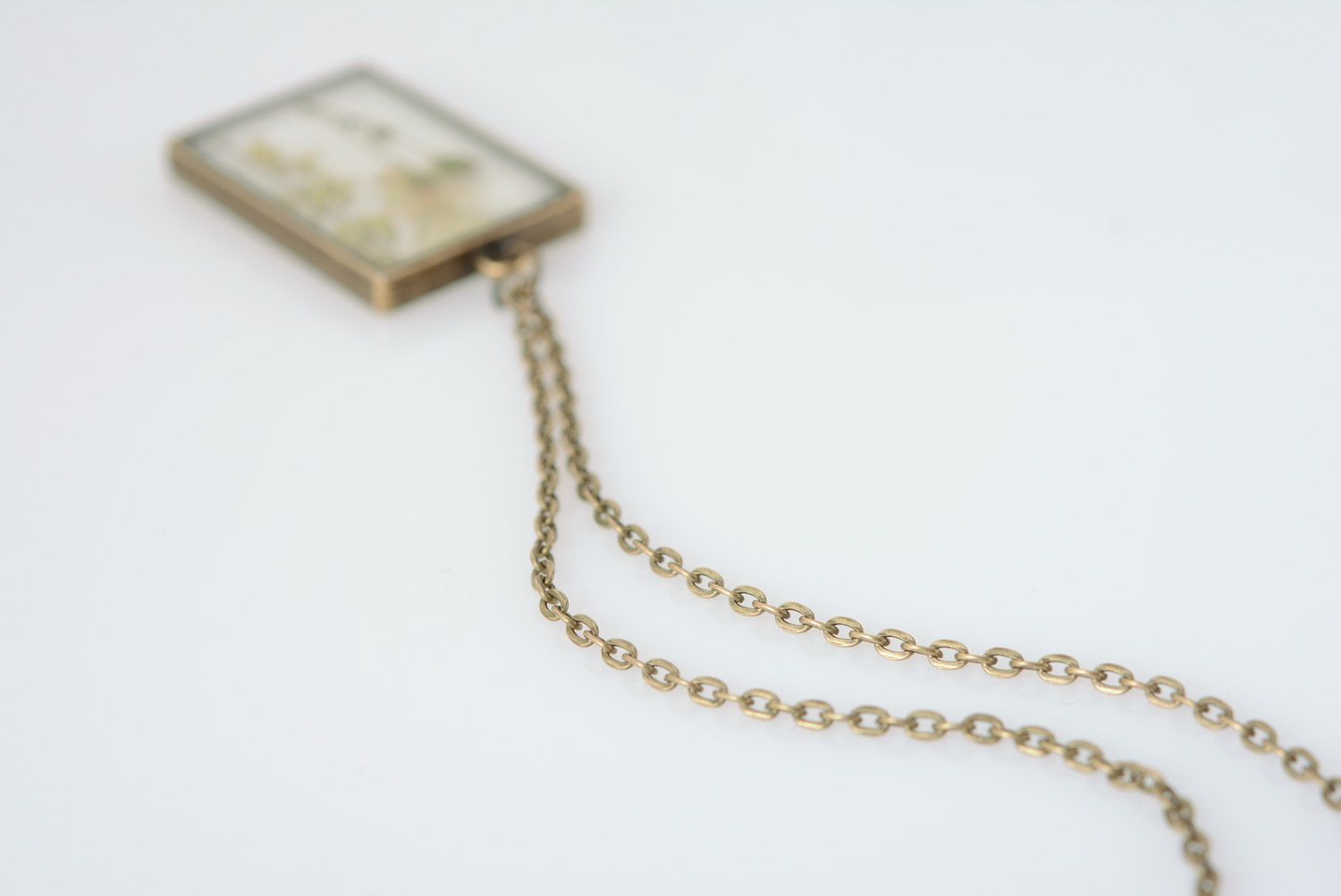 Light handmade rectangular transparent pendant with herbary in epoxy resin  photo 4