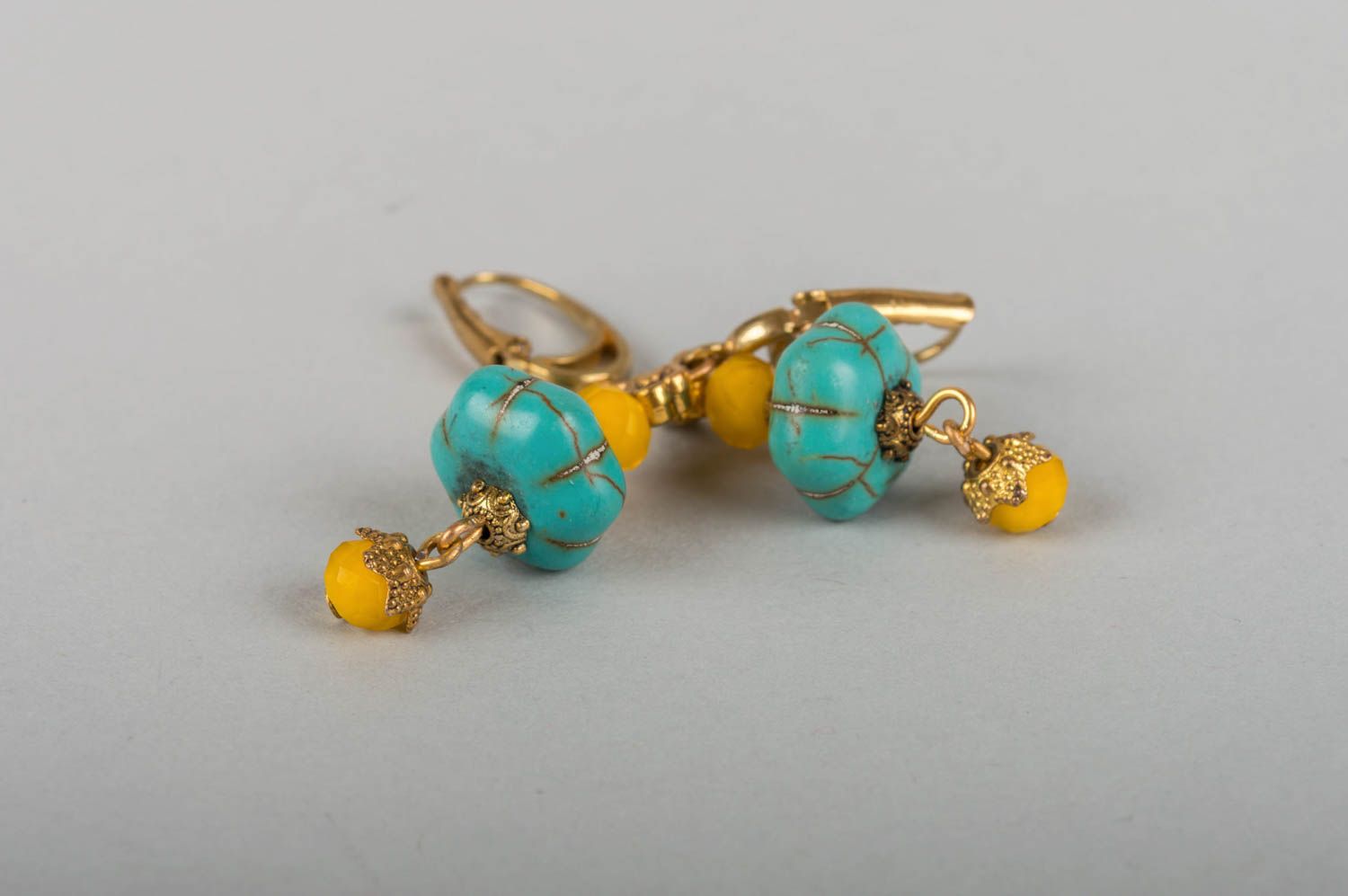 Beautiful handmade designer brass earrings with natural turquoise stone photo 5