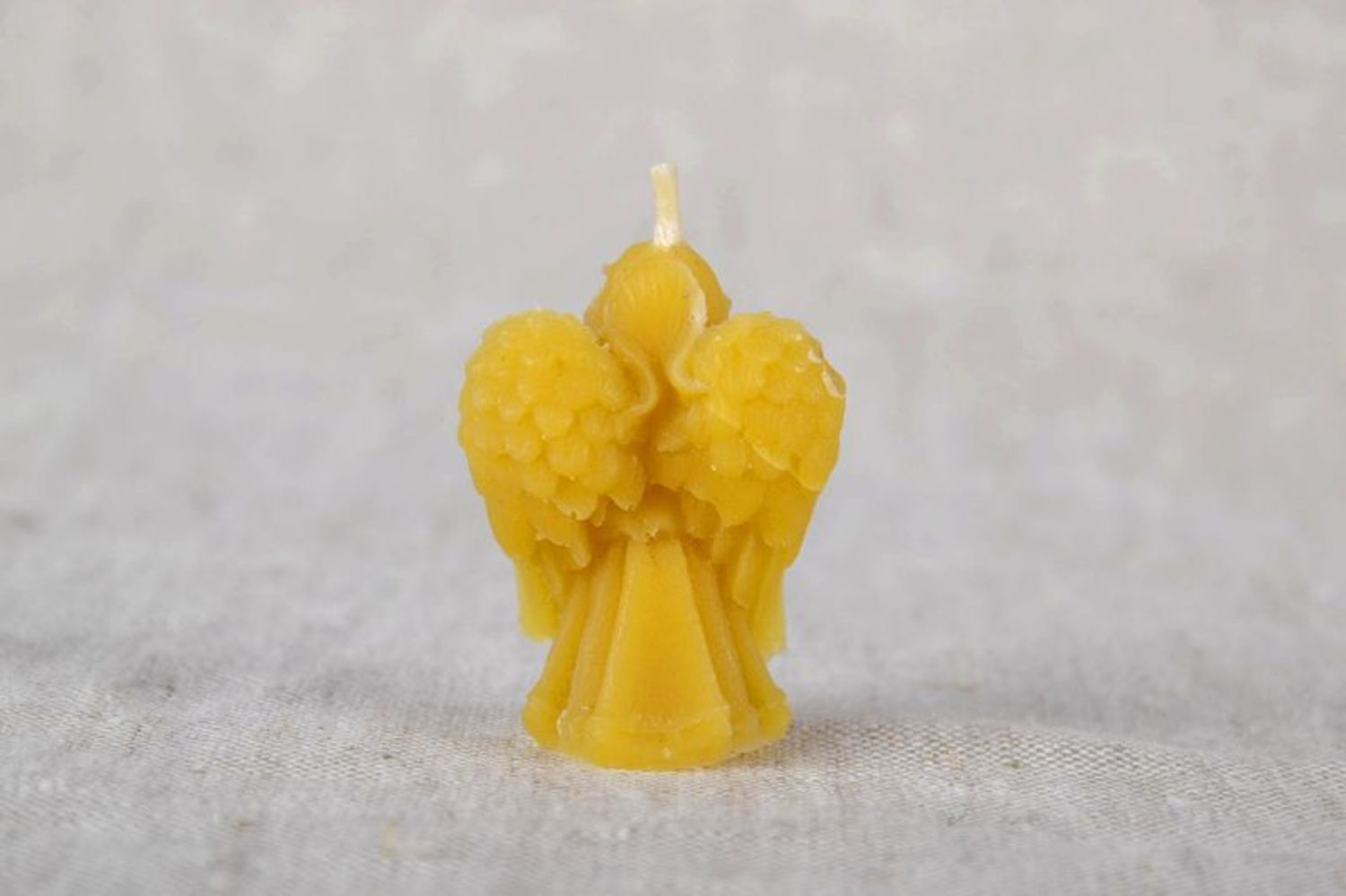 Candle made of natural wax Angel photo 3