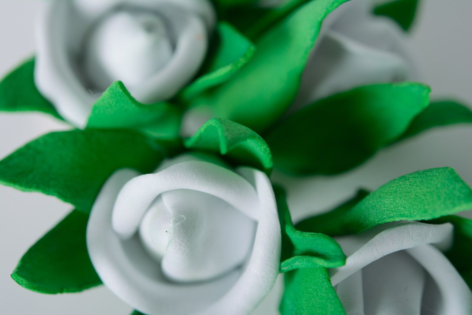 Stylish handmade foamiran fabric flower hair clip of white color with green petals photo 3
