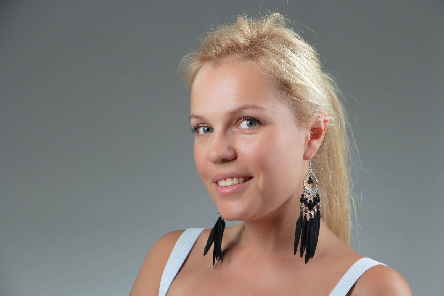 Earrings made of natural feathers  photo 4