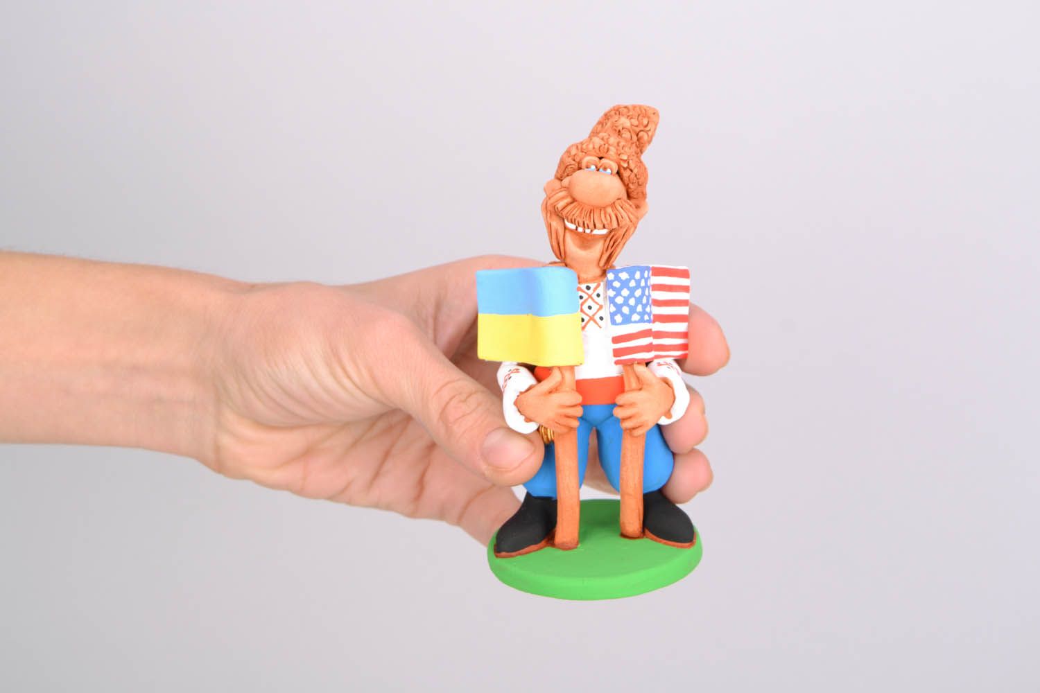Clay statuette Cossack with Two Flags photo 2