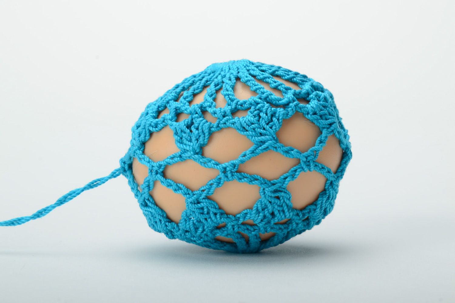 Homemade blue Easter egg crocheted over with cotton threads photo 4