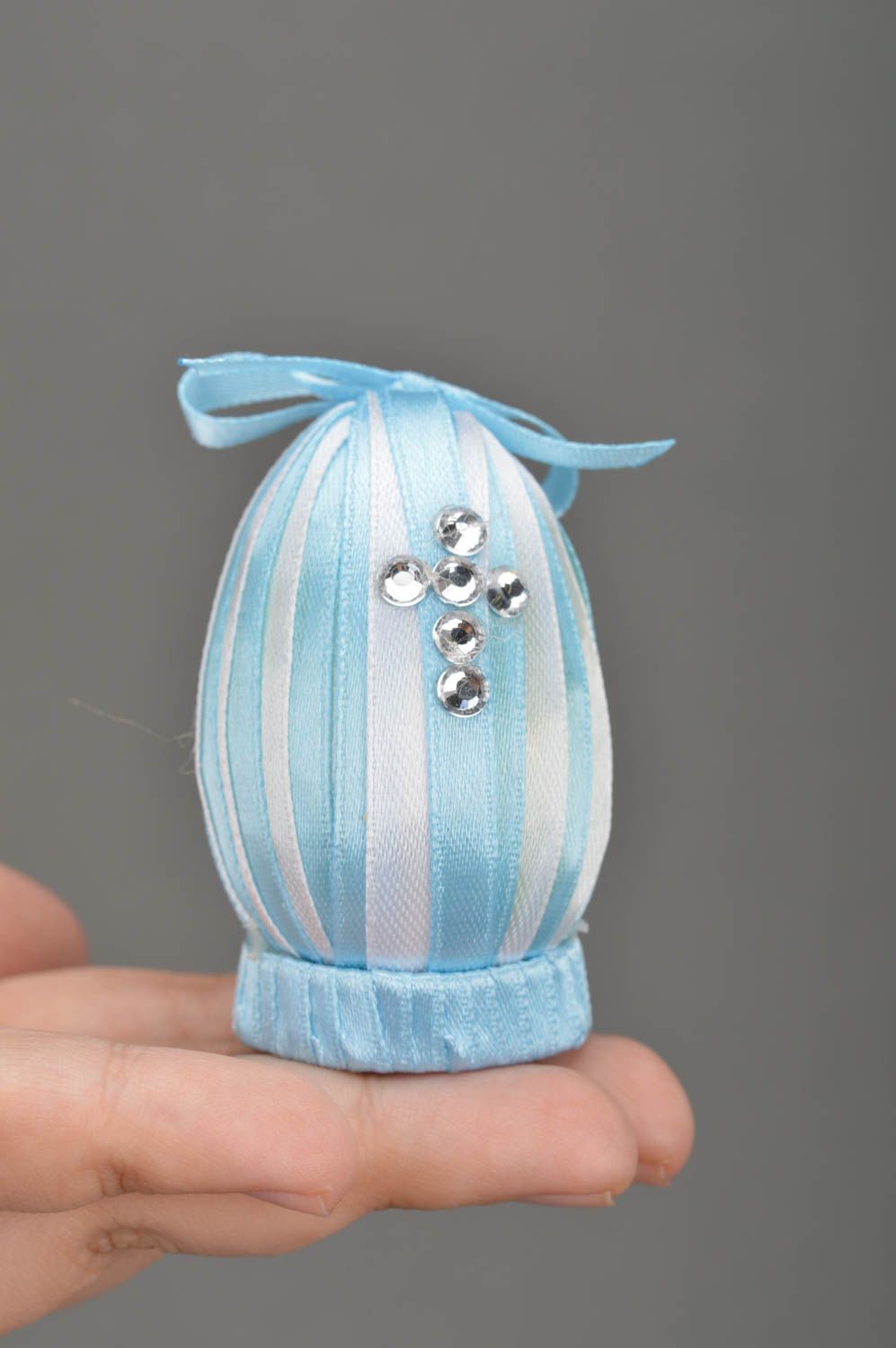 Handmade cute blue plastic Easter egg decorated with ribbons and strasses photo 3