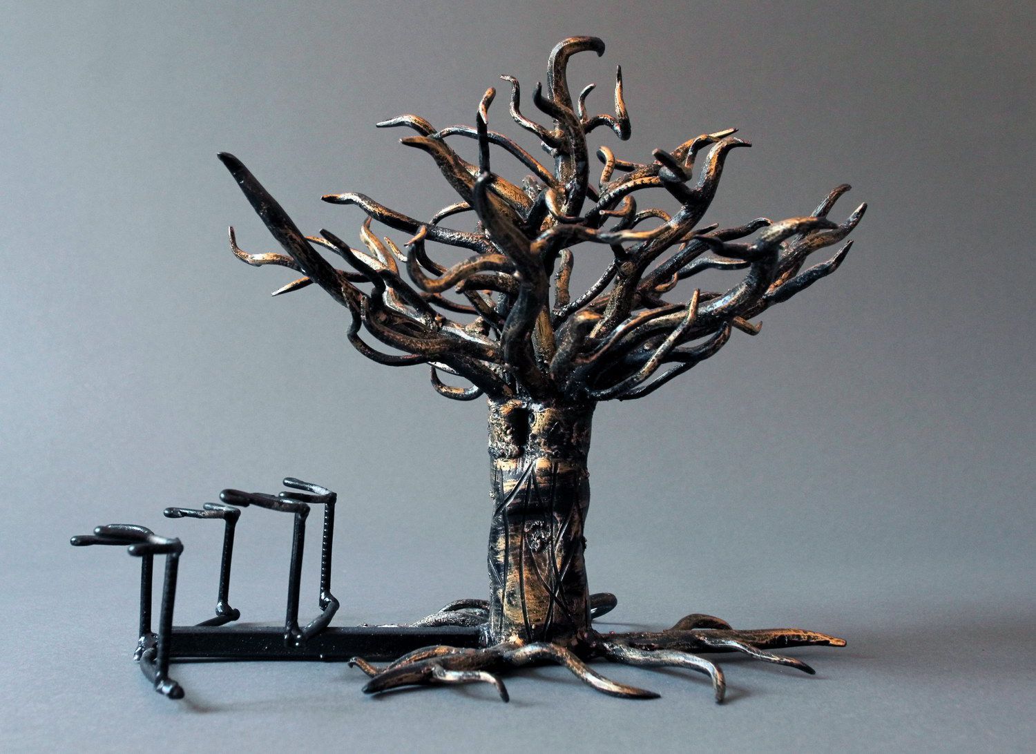 tree art on metal stand