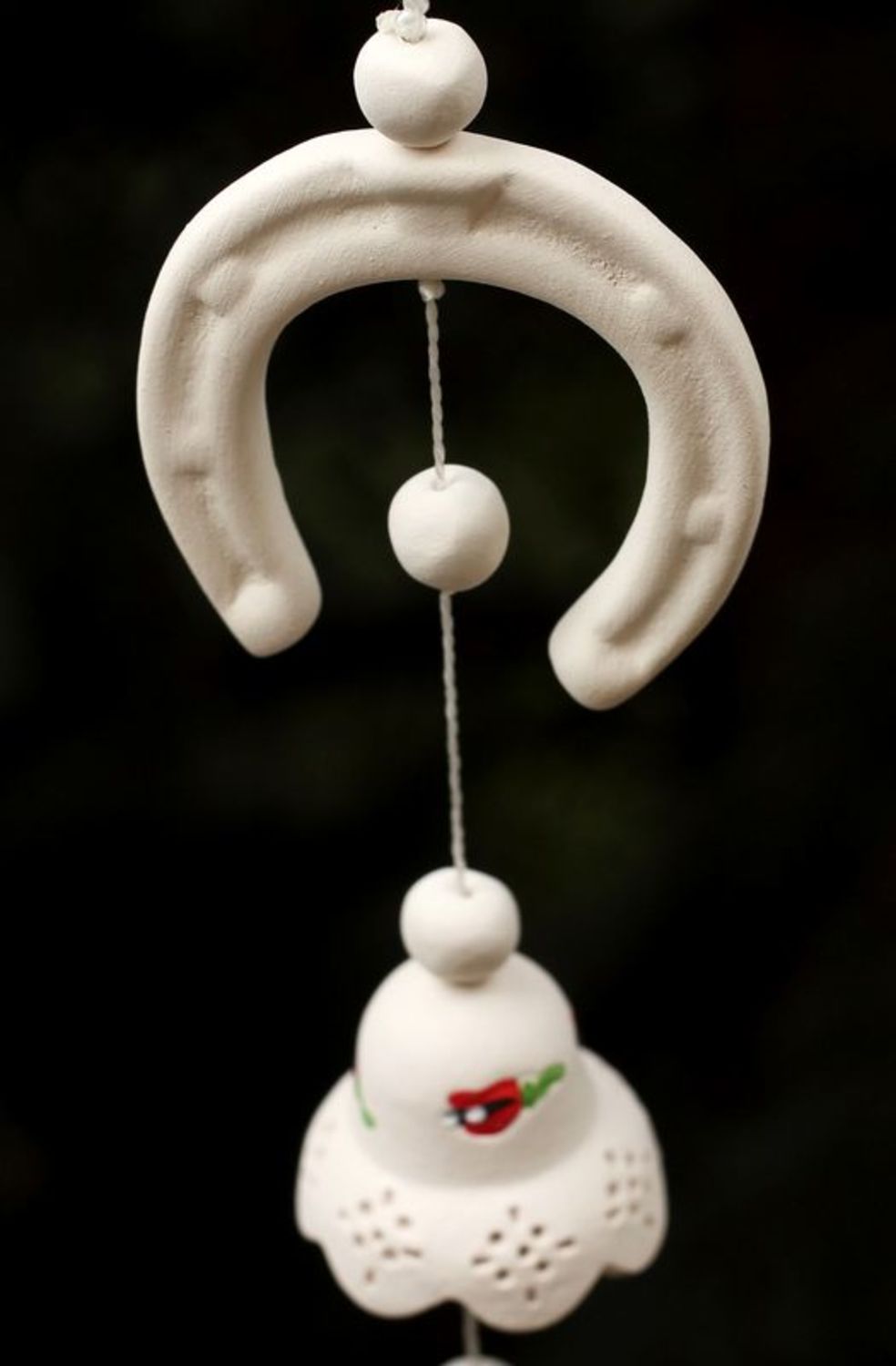 Ceramic bell with hanging horseshoe photo 1