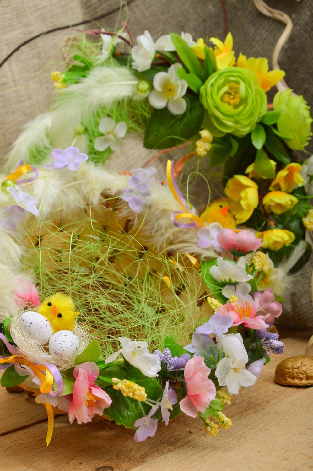 Easter composition made of wicker handmade basket and wreath for home decor photo 1