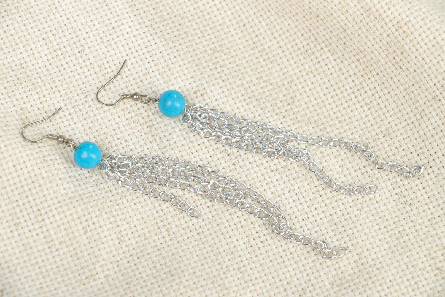 Metal earrings with chains and beads photo 4