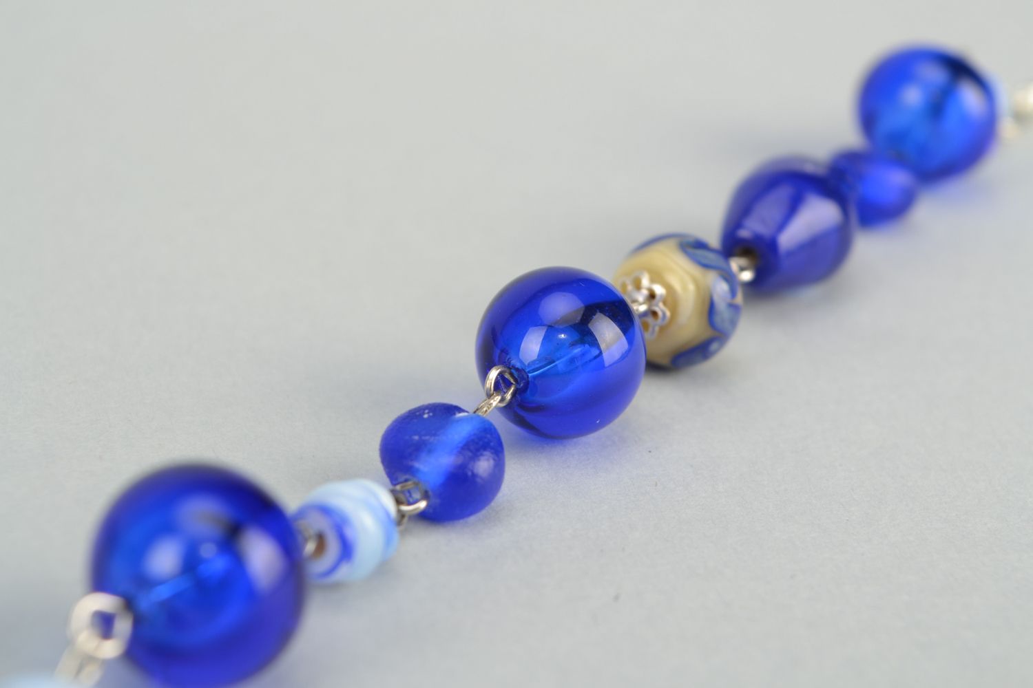 Interesting bracelet with blue lampwork glass beads photo 5