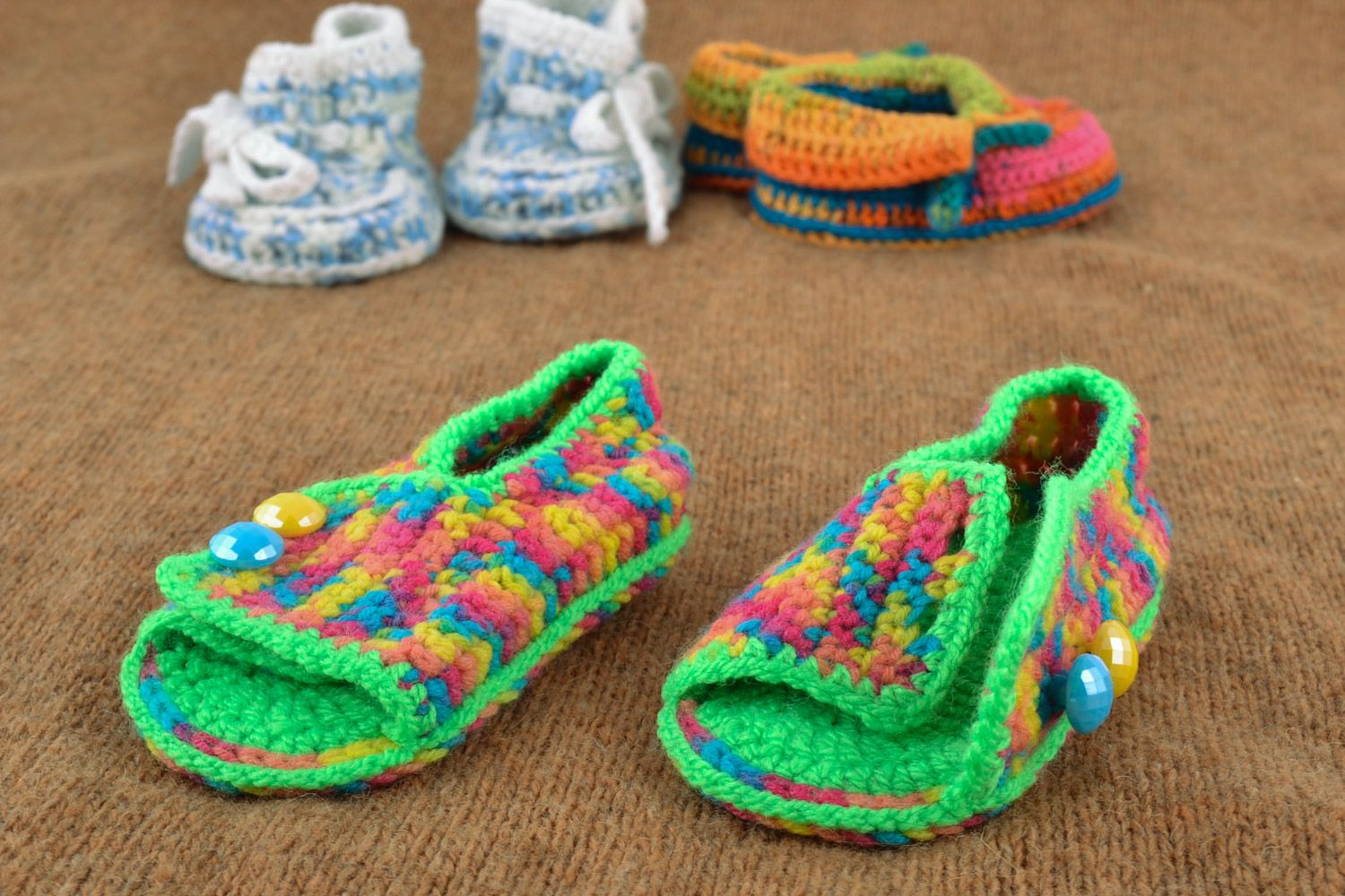 Green handmade knitted cotton baby booties in the shape of sandals with buttons photo 1