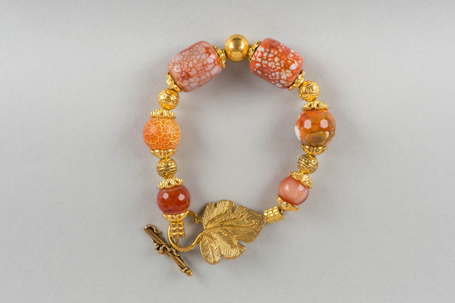 Handmade designer women's wrist bracelet with latten elements and agate beads photo 2