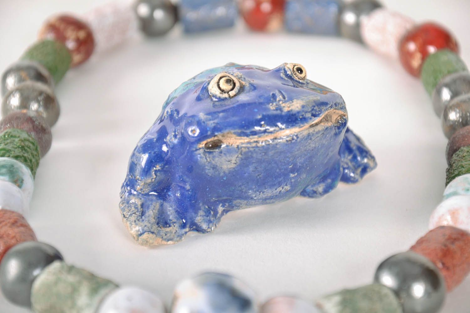 Ceramic figurine in the shape of a frog photo 1