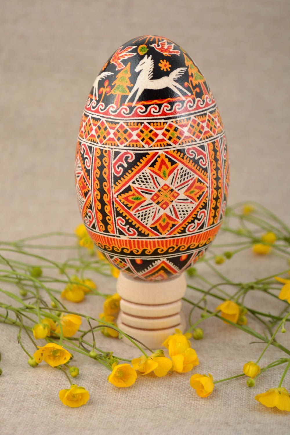 Easter egg painted with acrylic dyes goose handmade pysanka with horse pattern photo 1