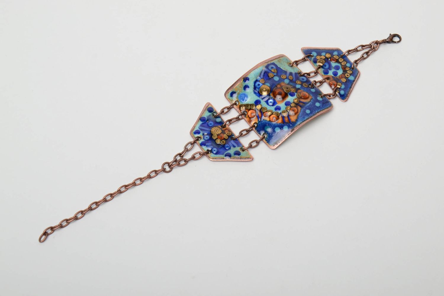 Copper bracelet painted with enamels of blue color photo 3