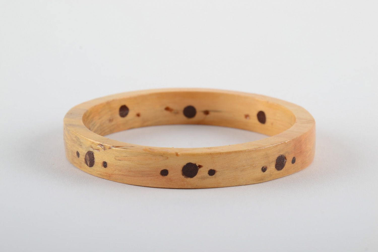 Tender light thin handmade wrist bracelet carved of wood with inlay for women photo 1
