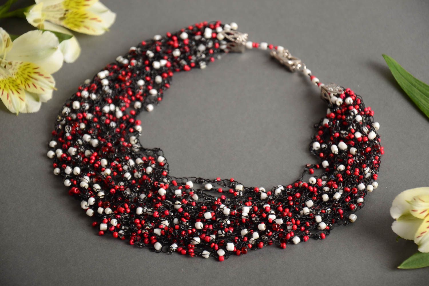 Handmade volume airy necklace crocheted of beads in white red and black colors photo 1