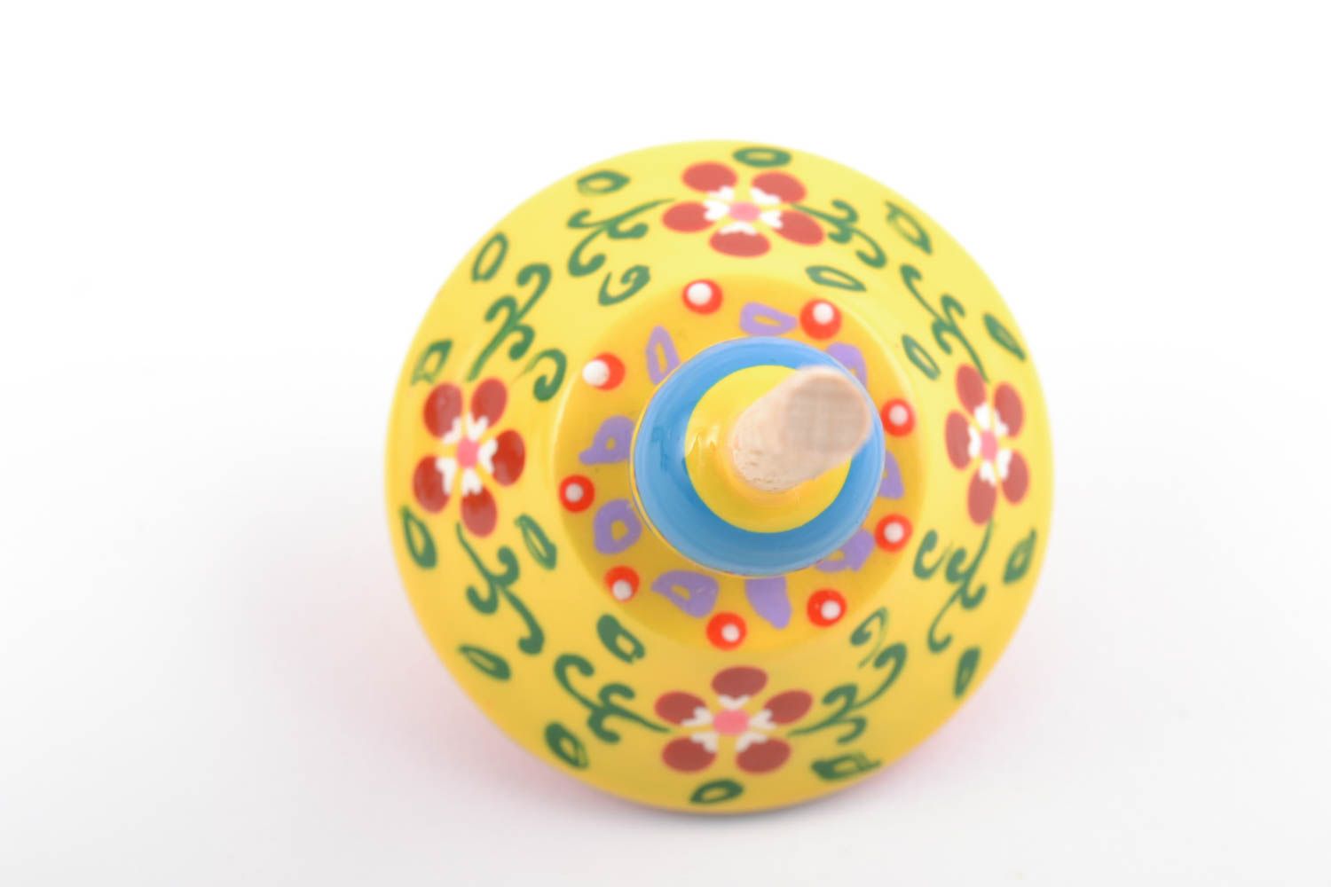 Wooden yellow handmade spinning top toy painted with eco dyes for children  photo 3