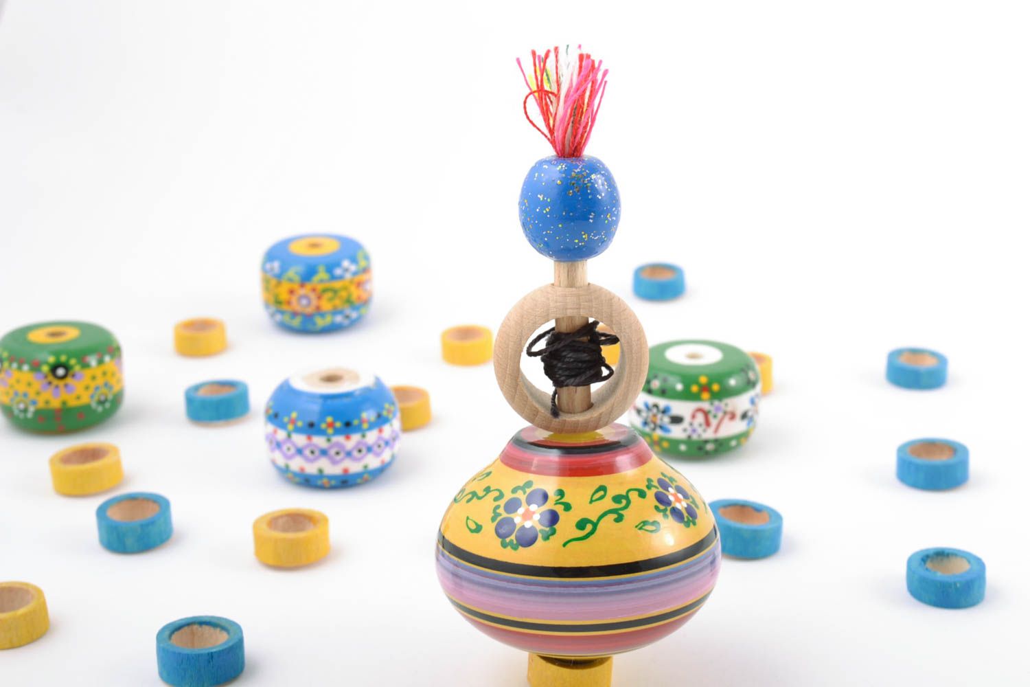 Toupie faite main en bois originale peinte multicolore rayée jouet pour enfant photo 1