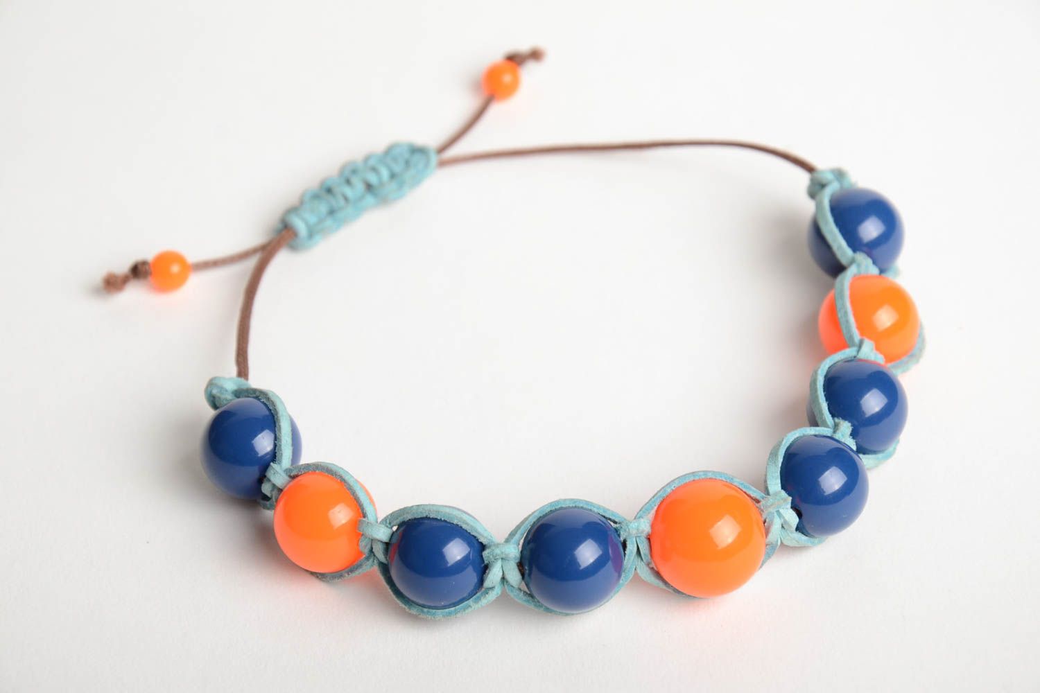 Handmade wrist bracelet woven of blue waxed cord and colorful plastic beads photo 3