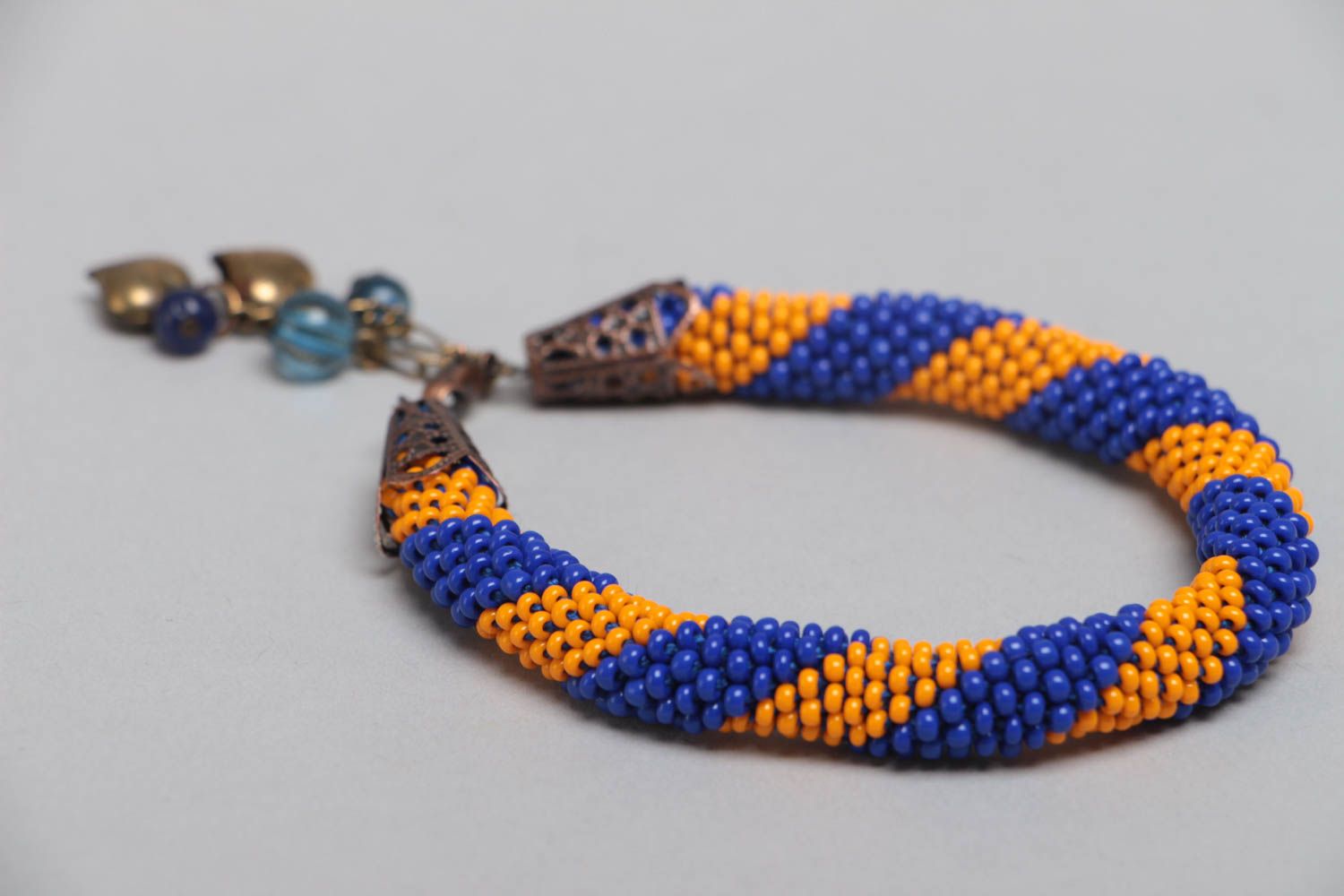 Bracelet spirale en perles de rocaille tchèques fait main couleur jaune bleu photo 3