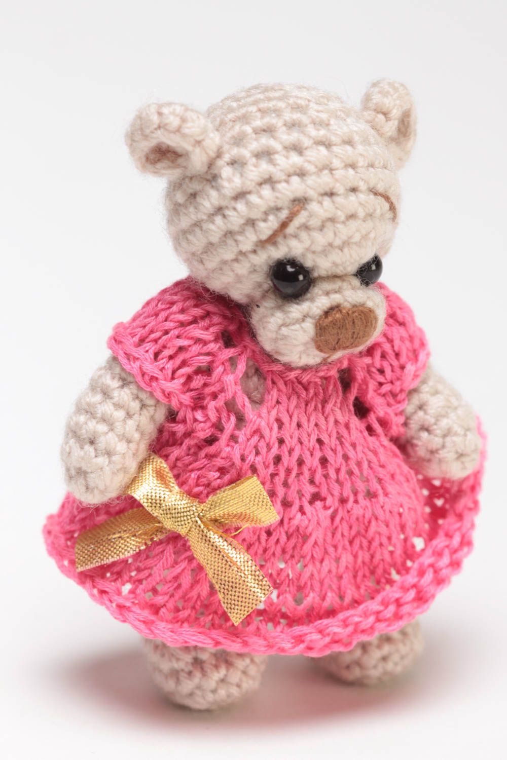 Small handmade beige soft toy bear in pink dress crocheted of acrylic threads  photo 2