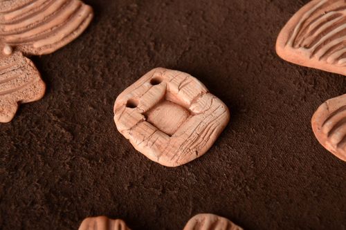Homemade decorative ceramic jewelry component for necklace making with openings - MADEheart.com