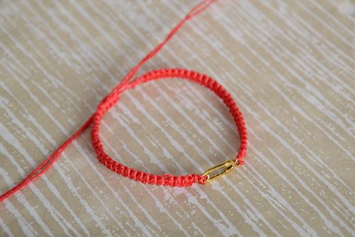 Handmade womens woven thread bracelet of red color with metal pin charm - MADEheart.com