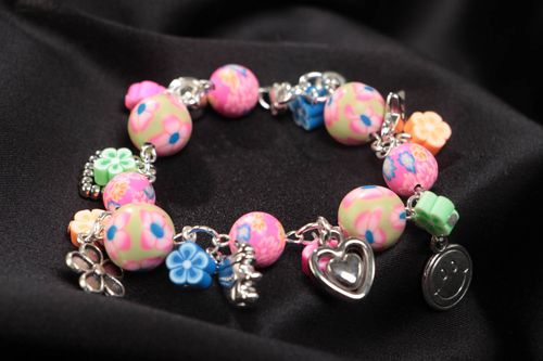 Handmade designer childrens pink wrist bracelet with plastic and acrylic beads - MADEheart.com
