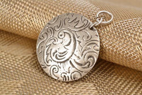 Metal pendant with pattern in the shape of firebird - MADEheart.com