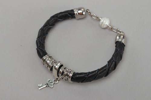 Thin handmade genuine leather bracelet with metal angel charm and magnet lock - MADEheart.com
